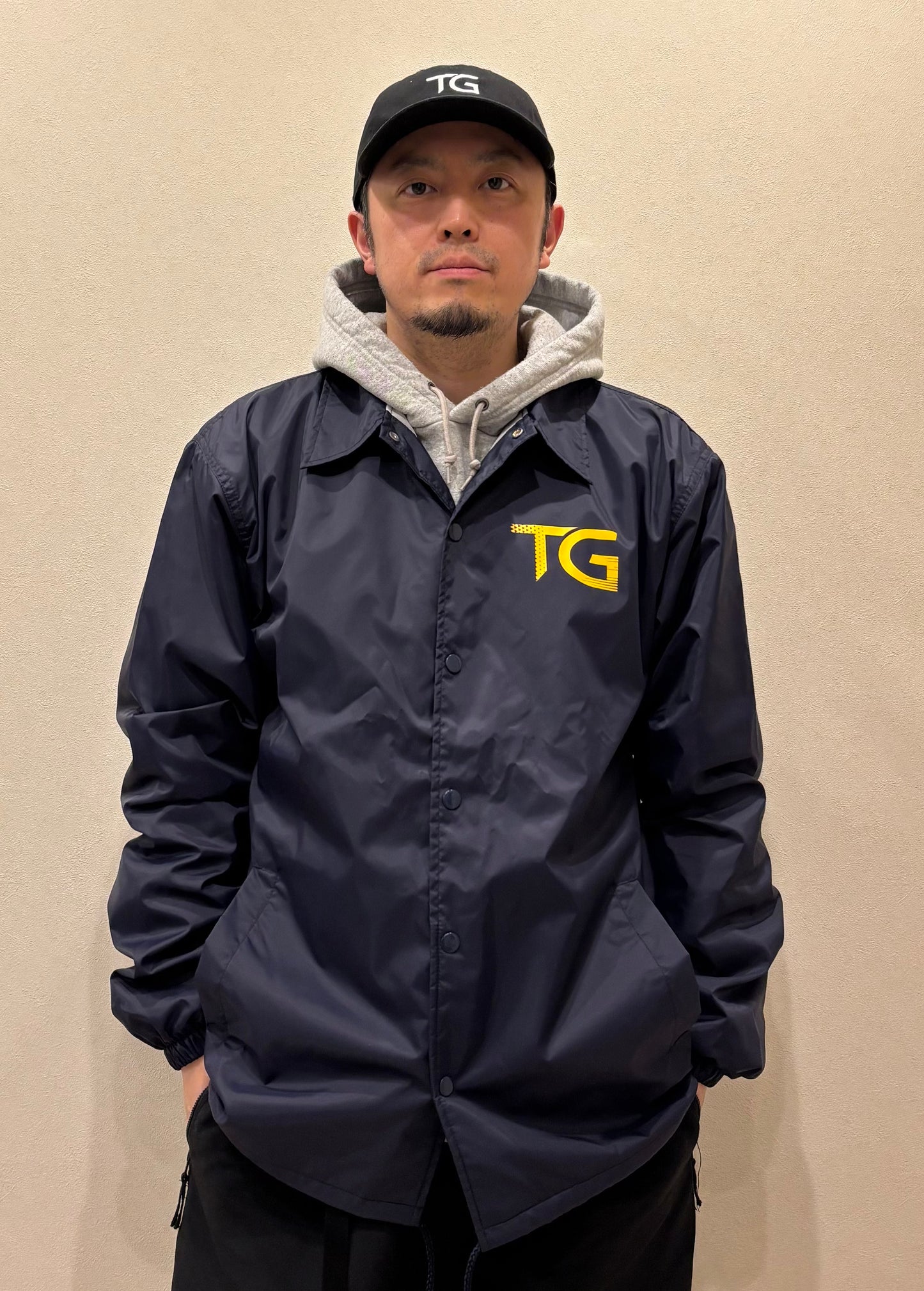 TGロゴ コーチジャケット